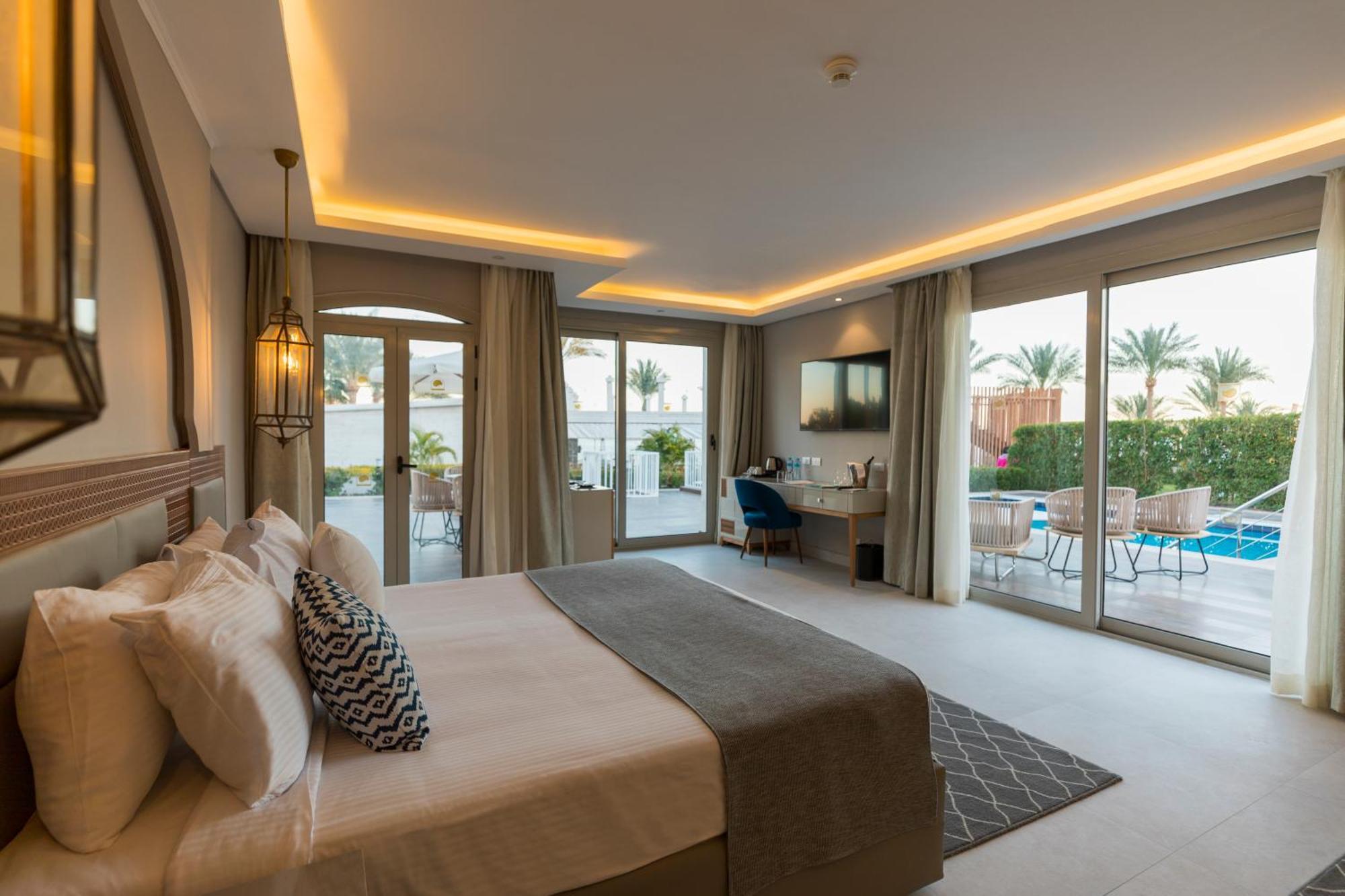 Sunrise Diamond Beach Resort -Grand Select Sharm El Sheikk Quarto foto A bedroom at the hotel